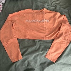 Alphalete Women's Orange Long Sleeve Crop Top